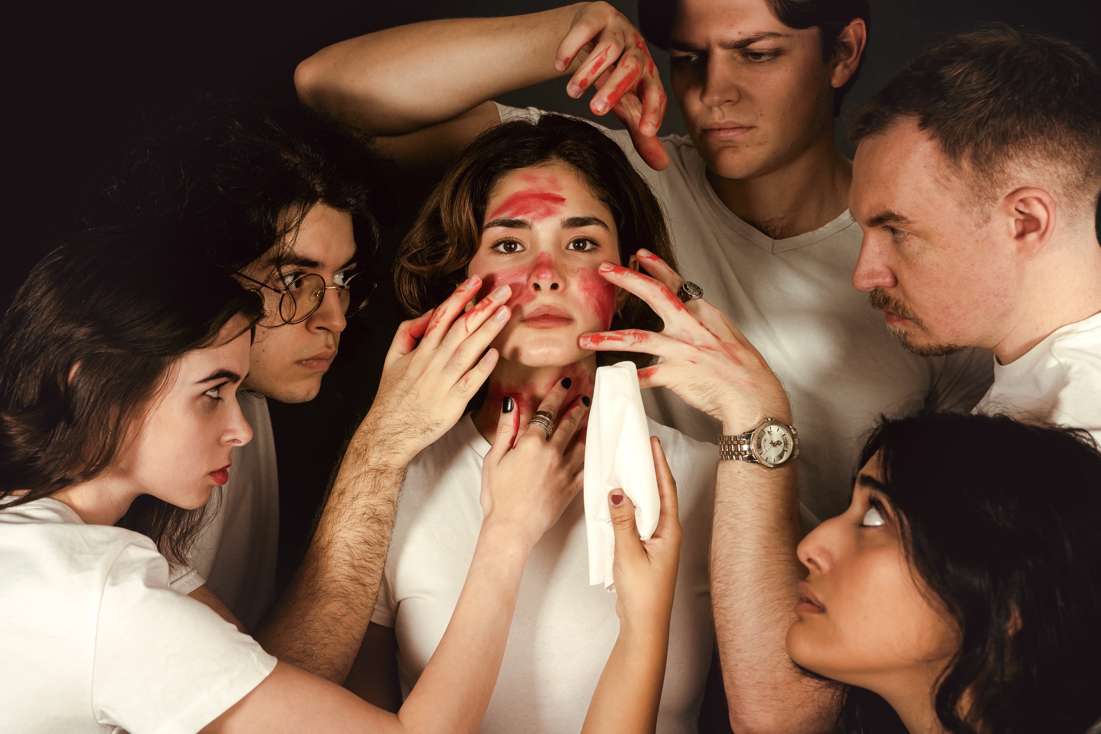 Actor leaning into a spotlight